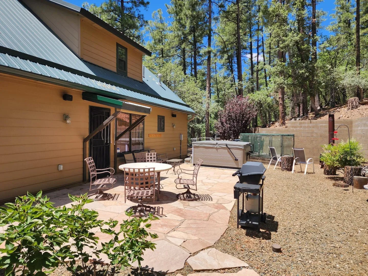 A bright summer day at a cabin in the Prescott pines