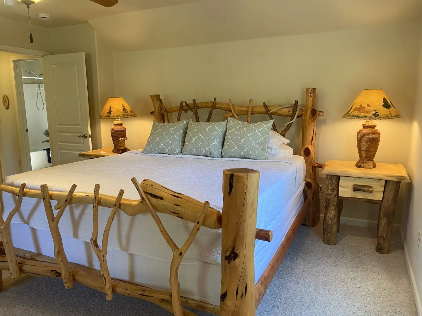 King bedroom with warm lamplight